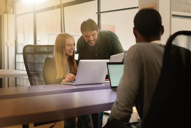 Workers busy working in modern office space